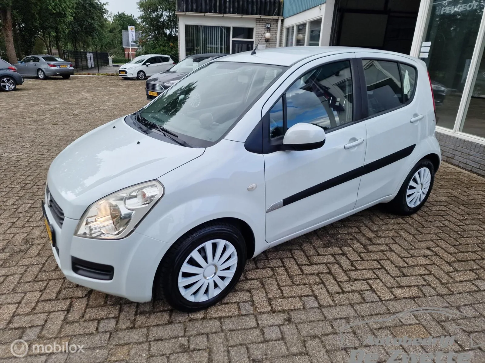 Suzuki Splash (2011) — foto 1