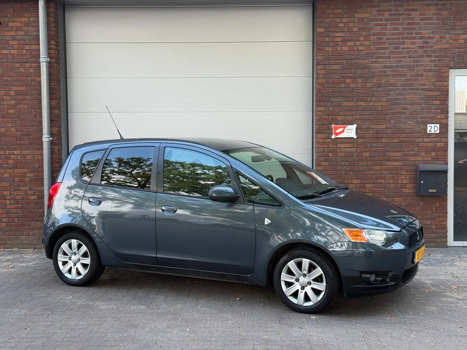 Mitsubishi Colt (2010) — foto 1