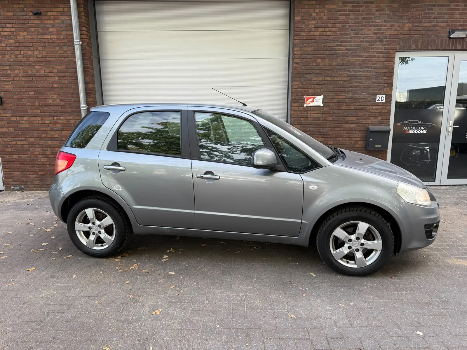 Suzuki SX4 (2011) — foto 1
