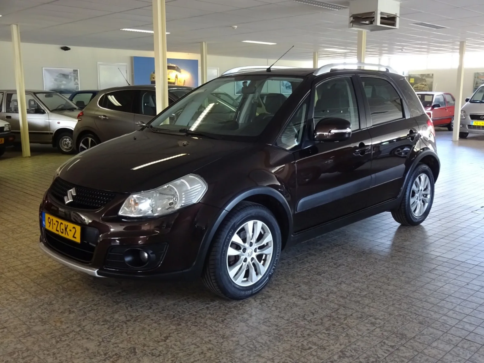 Suzuki SX4 (2012) — foto 1
