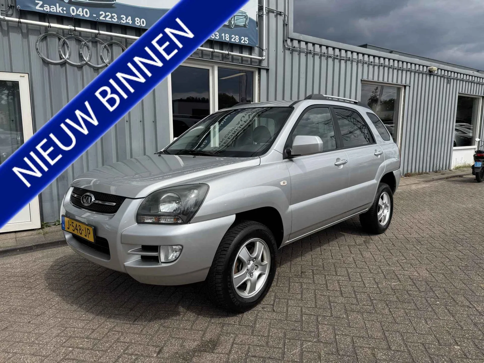 Kia Sportage (2008) — foto 1