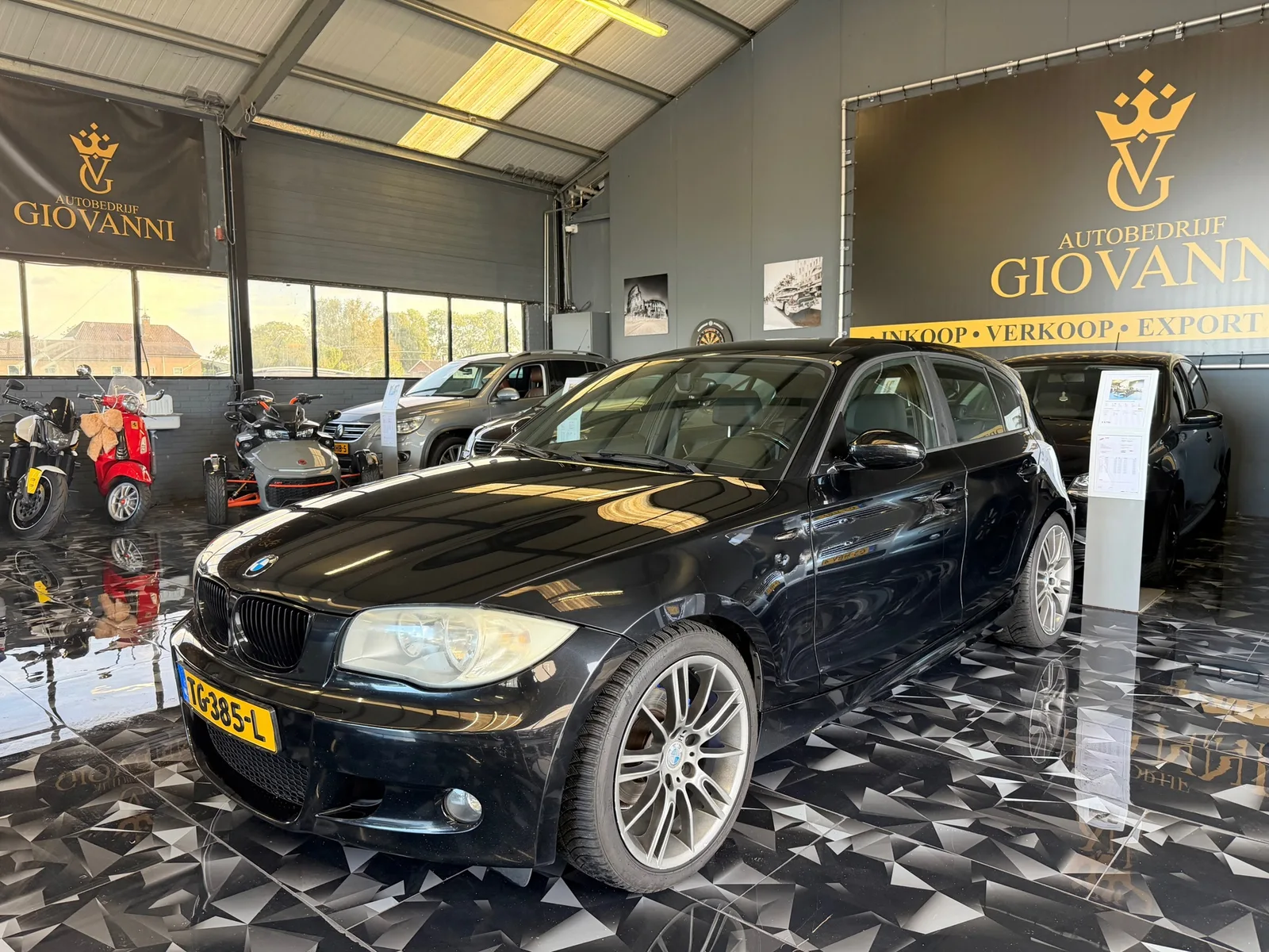 BMW 1-Serie (2006) — foto 1