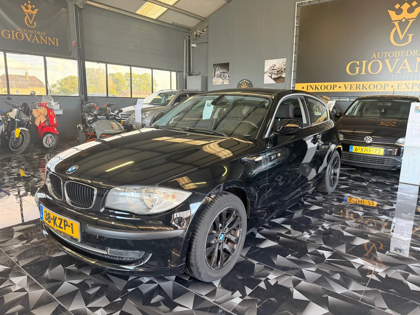 BMW 1-Serie (2010) — foto 1