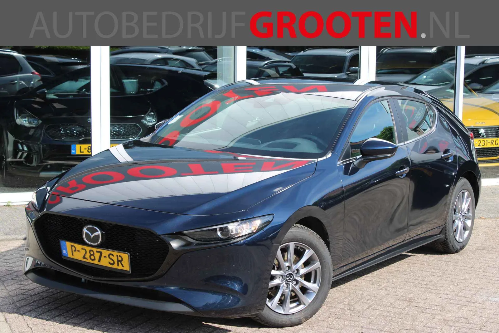Mazda 3 (2022) — foto 1