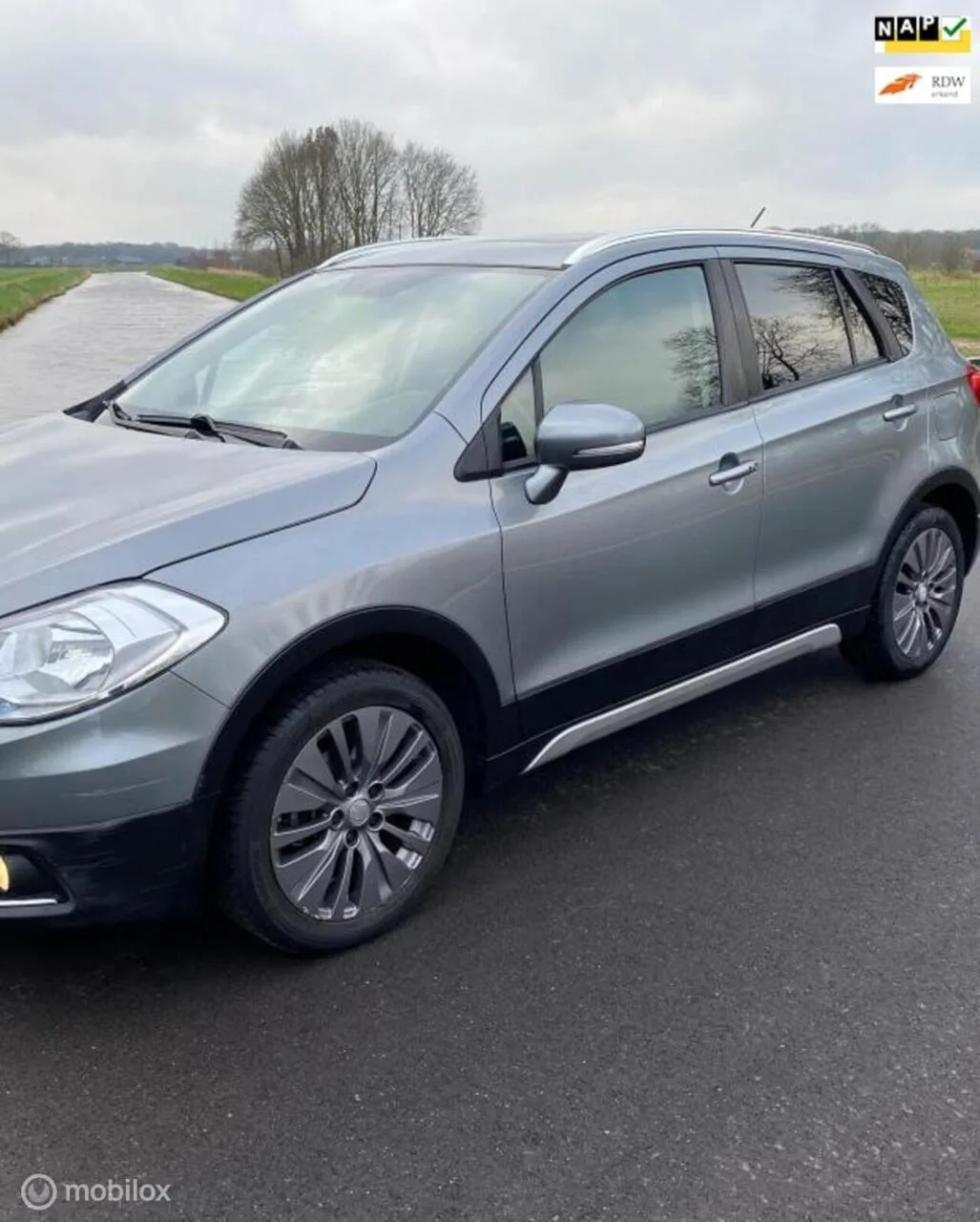 Suzuki SX4 (2013) — foto 1