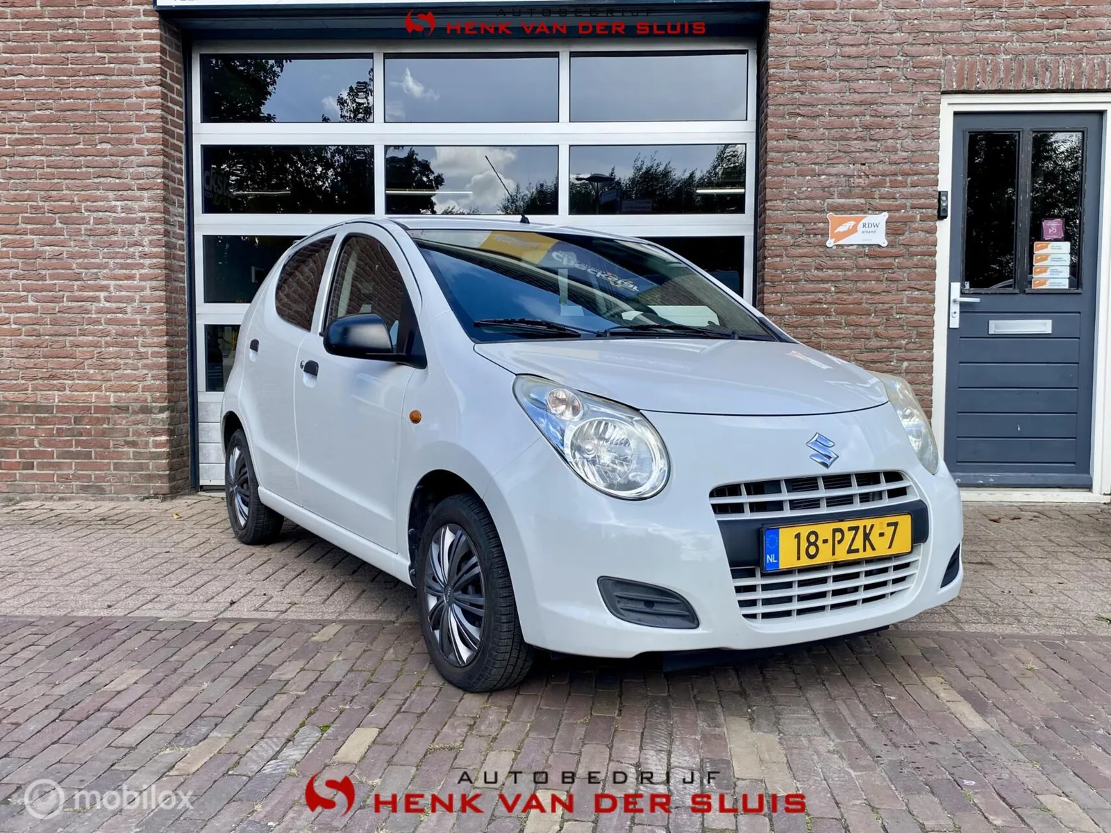 Suzuki Alto (2011) — foto 1