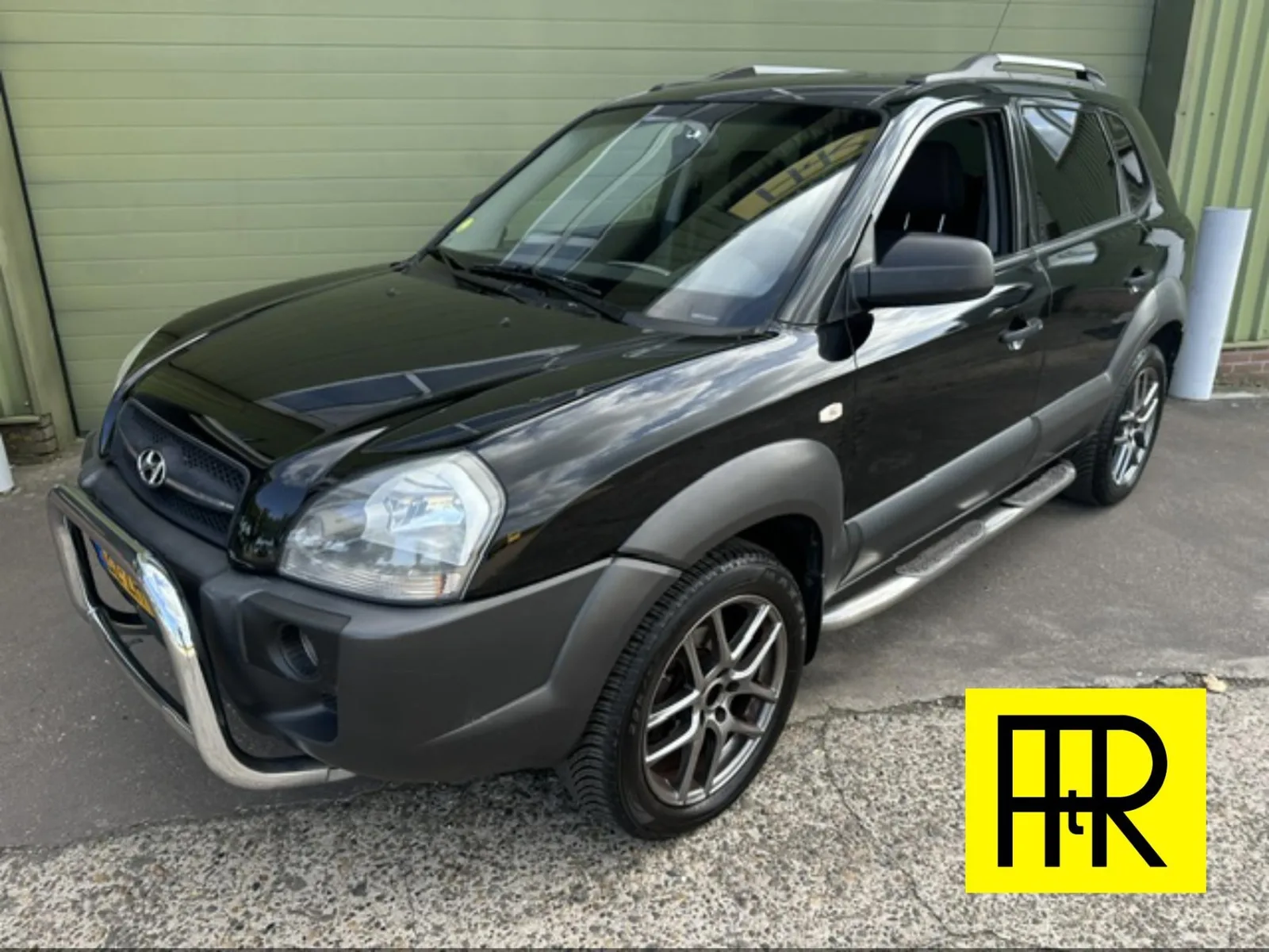 Hyundai Tucson (2008) — foto 1