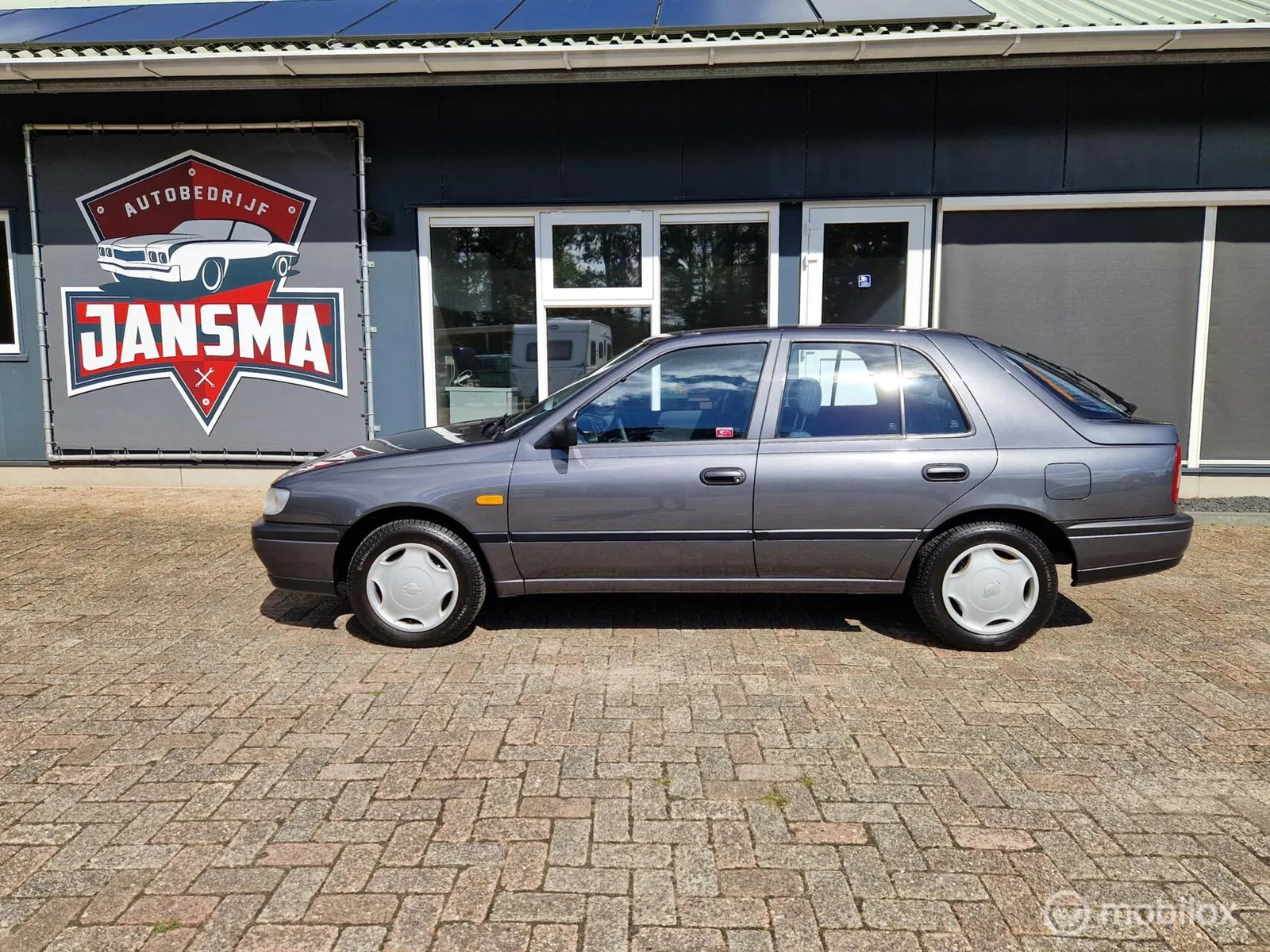 Nissan Sunny (1995) — foto 1