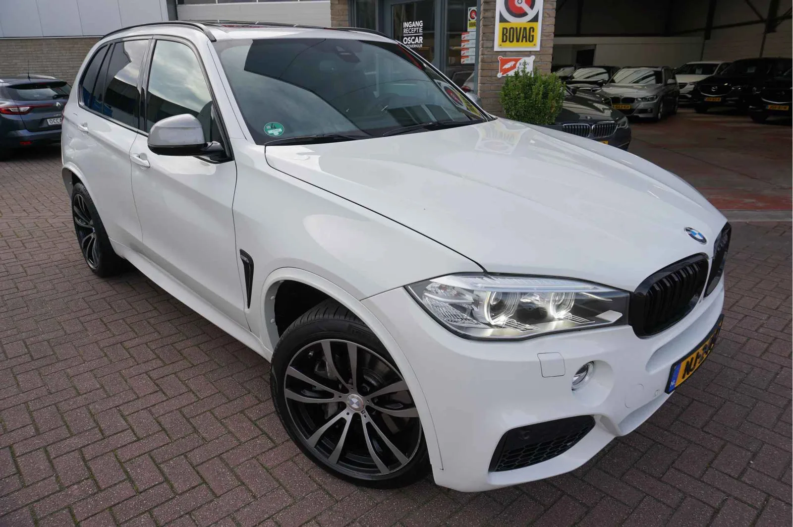 BMW X5 (2014) — foto 1
