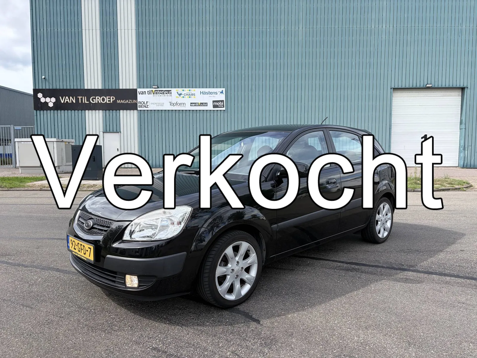Kia Rio (2009) — foto 1