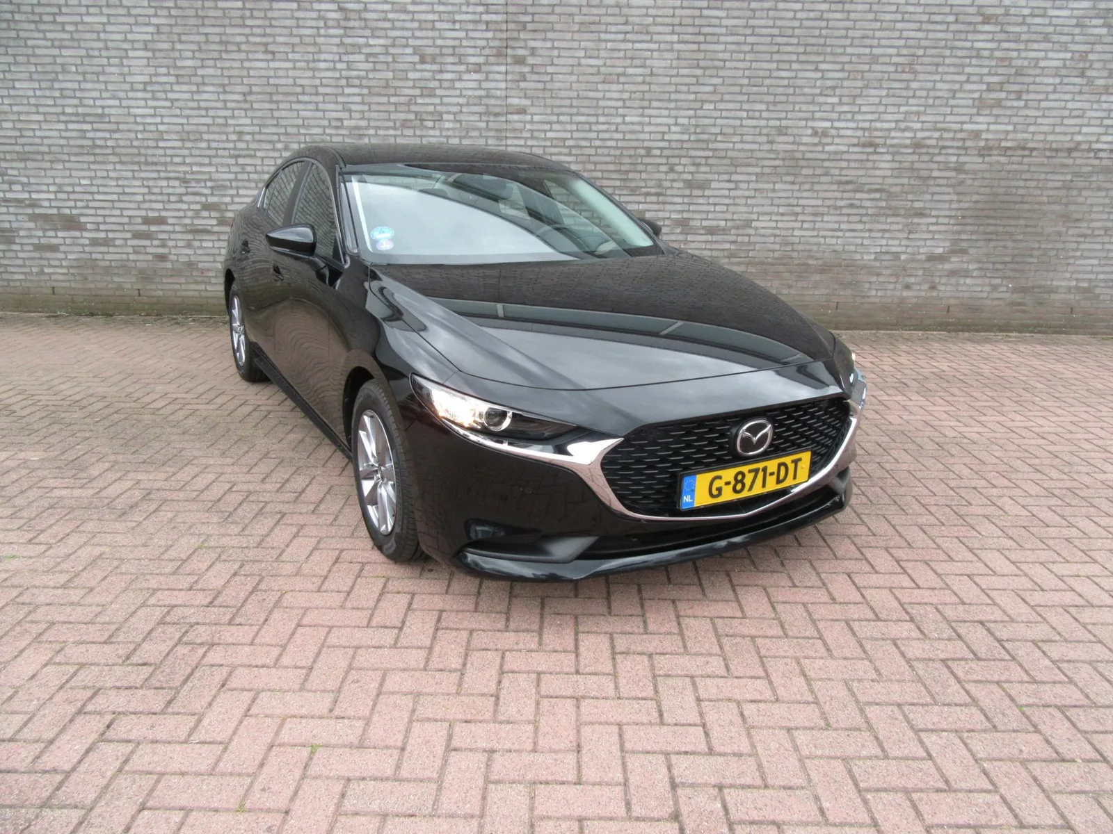 Mazda 3 (2019) — foto 1
