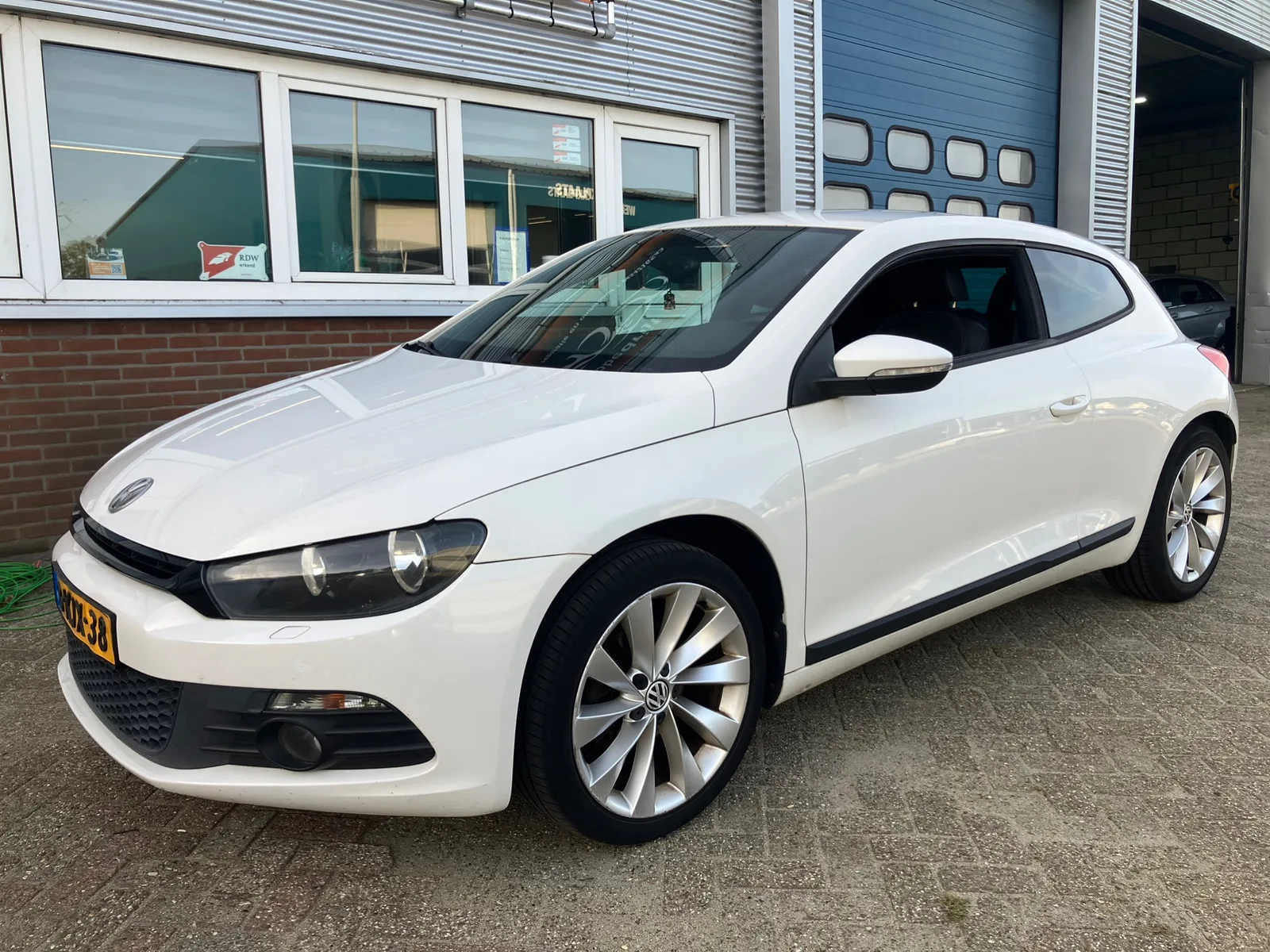 Volkswagen Scirocco (2009) — foto 1