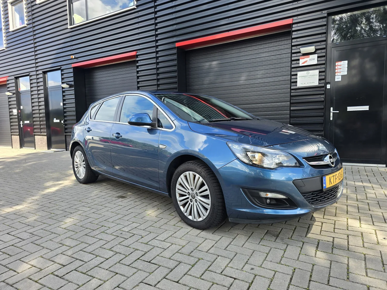 Opel Astra (2014) — foto 1