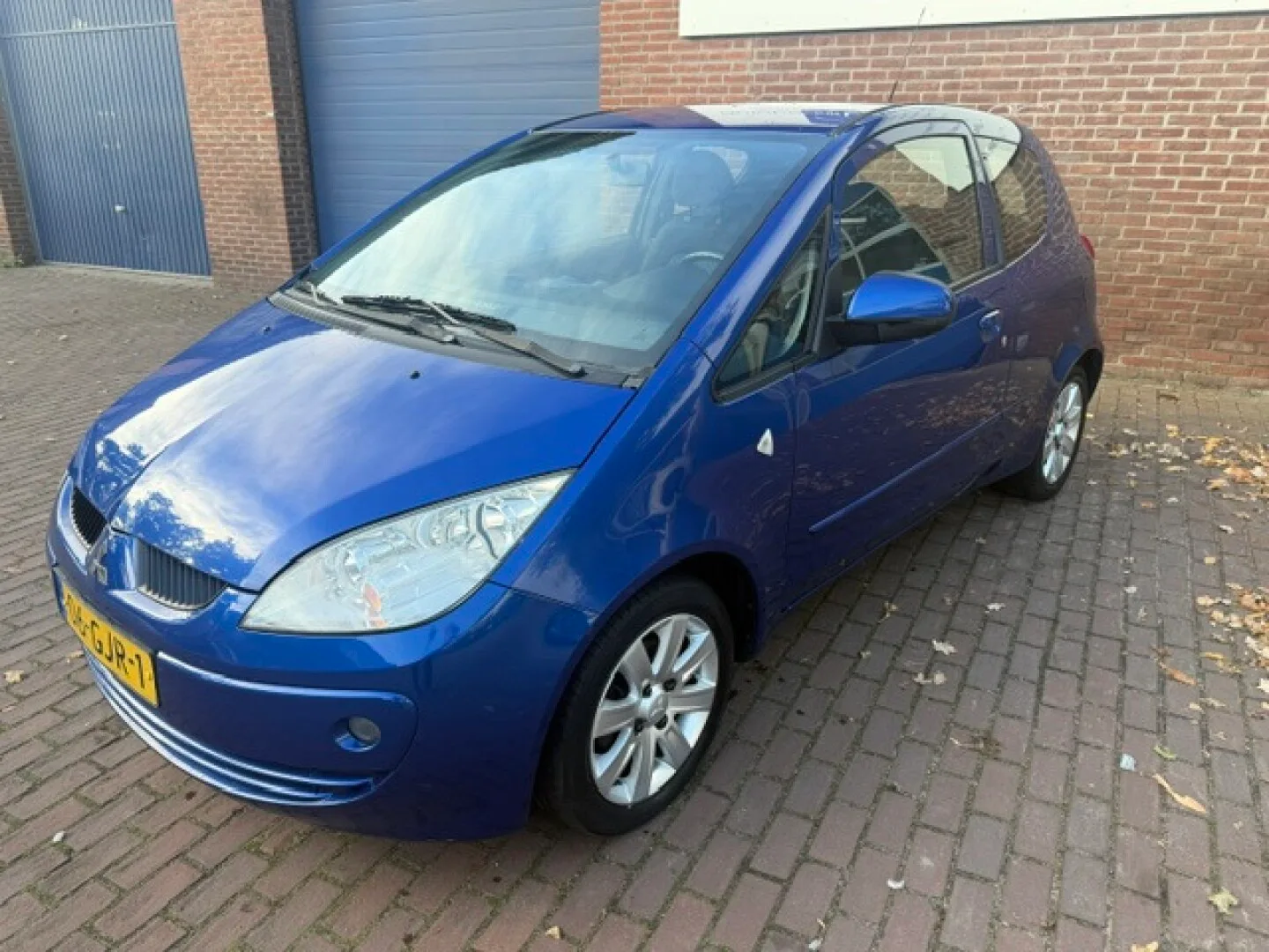 Mitsubishi Colt (2008) — foto 1