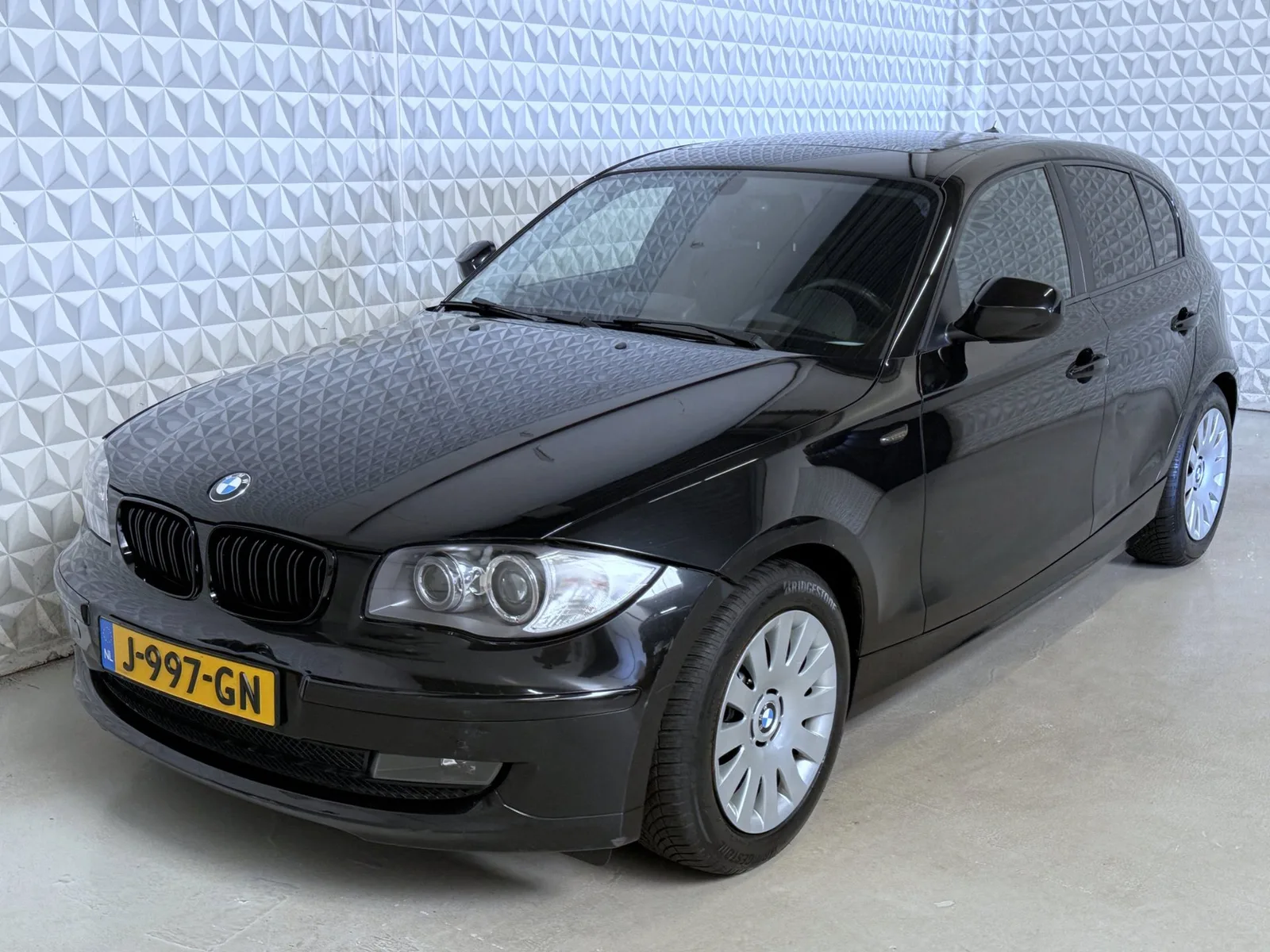 BMW 1-Serie (2009) — foto 1