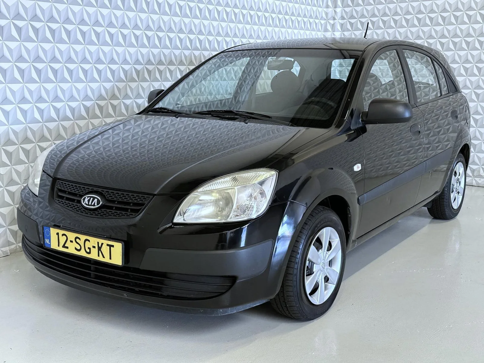 Kia Rio (2006) — foto 1