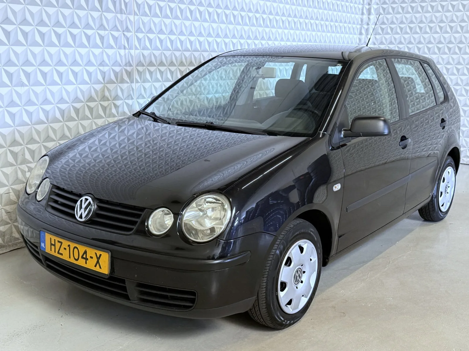 Volkswagen Polo (2003) — foto 1