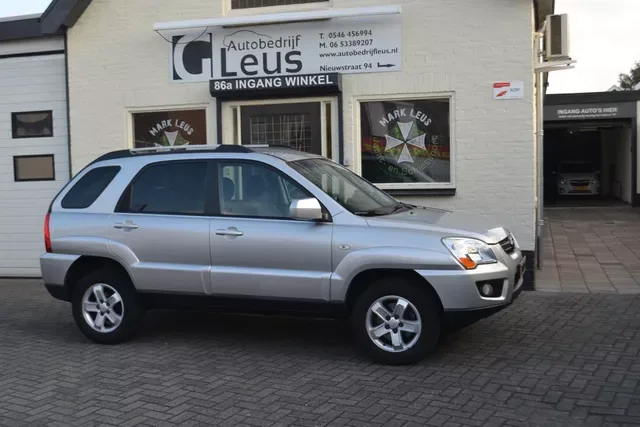 Kia Sportage (2009) — foto 1