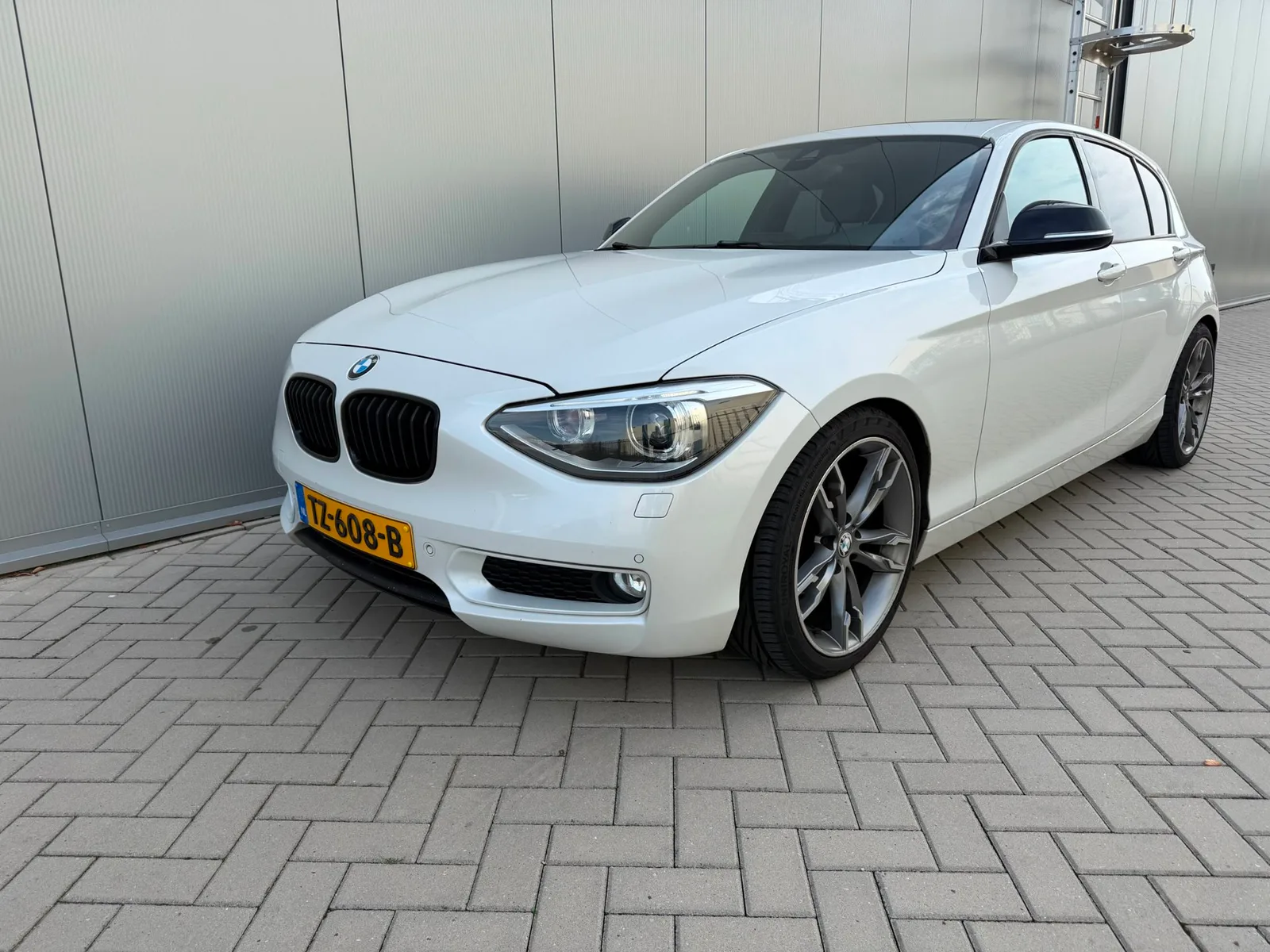 BMW 1-Serie (2012) — foto 1