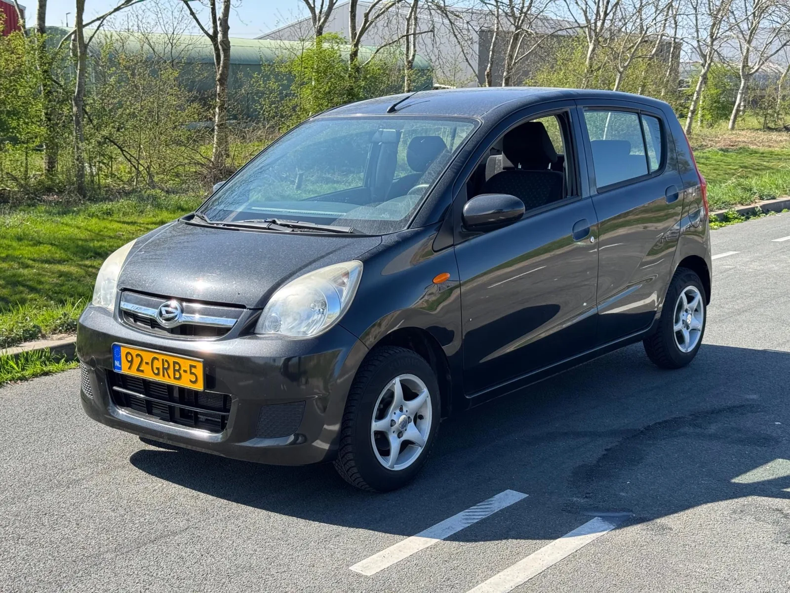 Daihatsu Cuore (2008) — foto 1