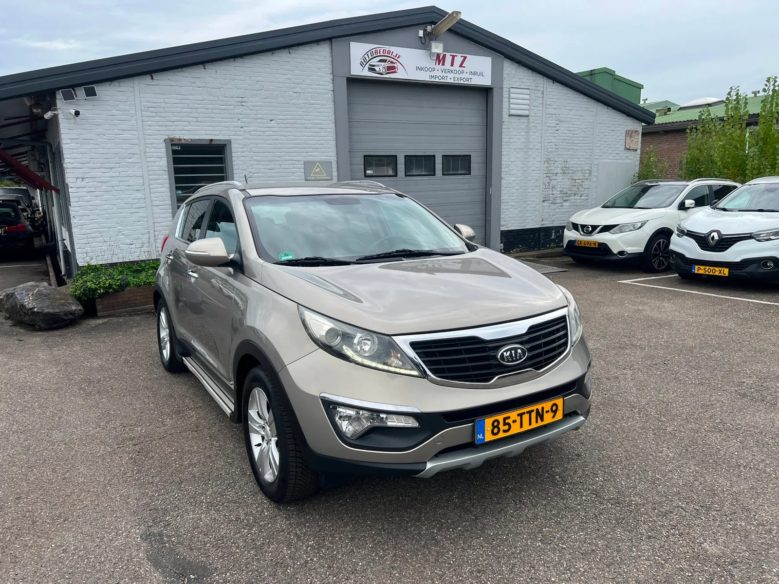Kia Sportage (2012) — foto 1