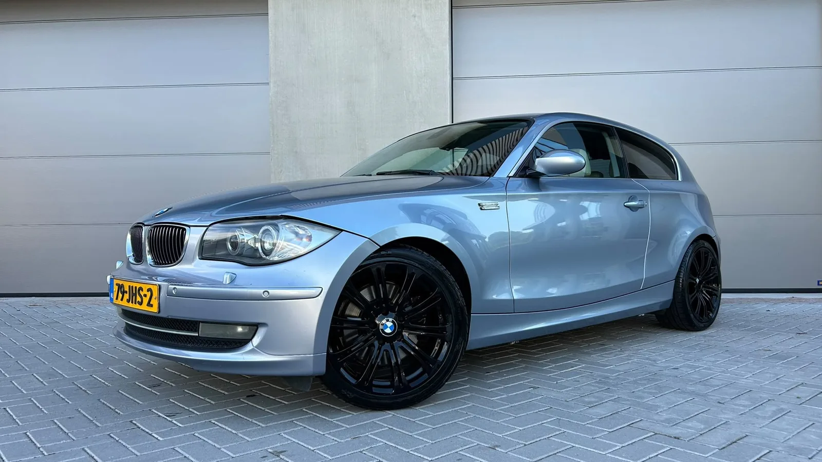BMW 1-Serie (2009) — foto 1