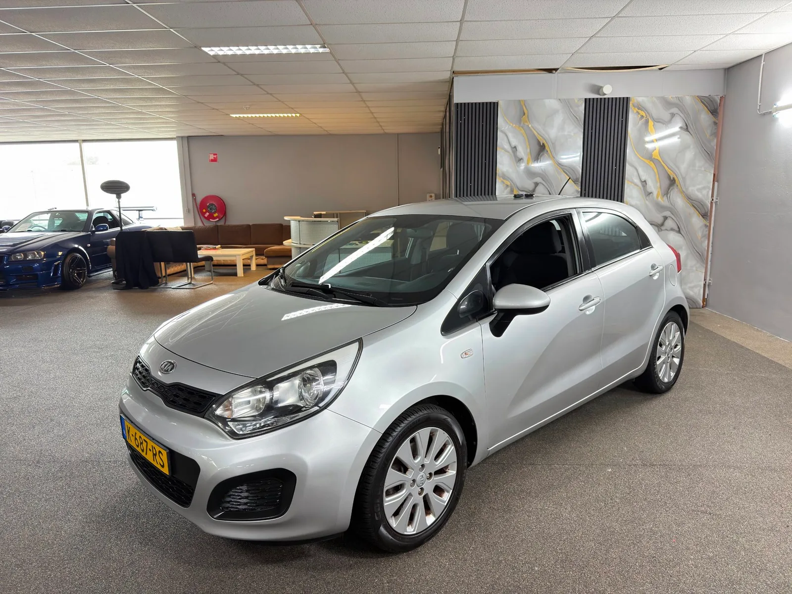 Kia Rio (2012) — foto 1
