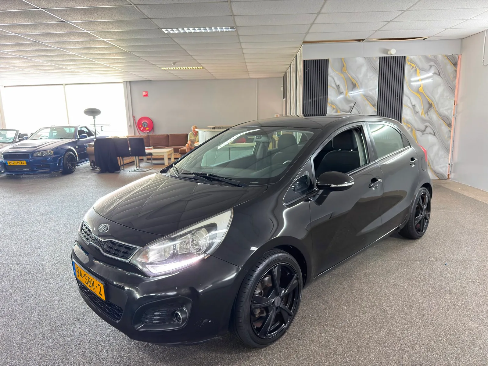 Kia Rio (2011) — foto 1