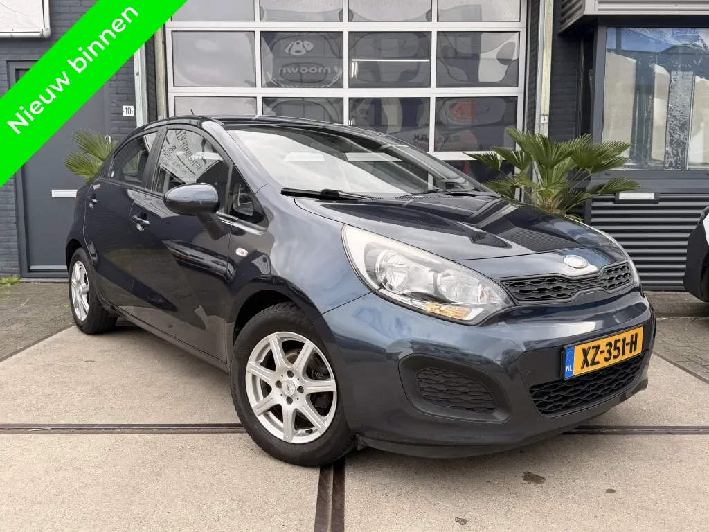 Kia Rio (2014) — foto 1