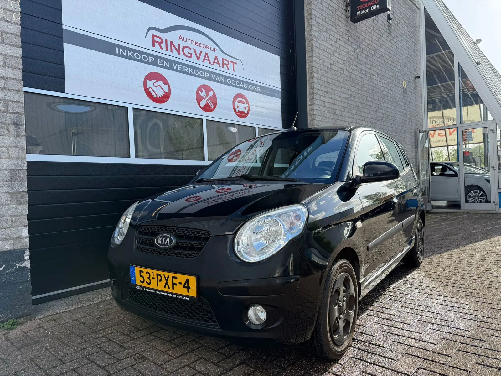 Kia Picanto (2011) — foto 1
