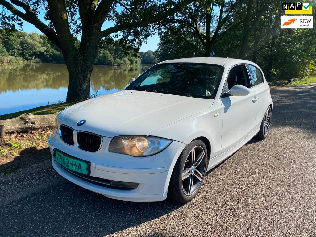 BMW 1-Serie (2009) — foto 1
