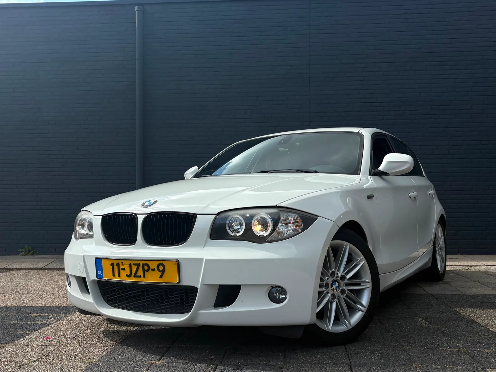 BMW 1-Serie (2009) — foto 1