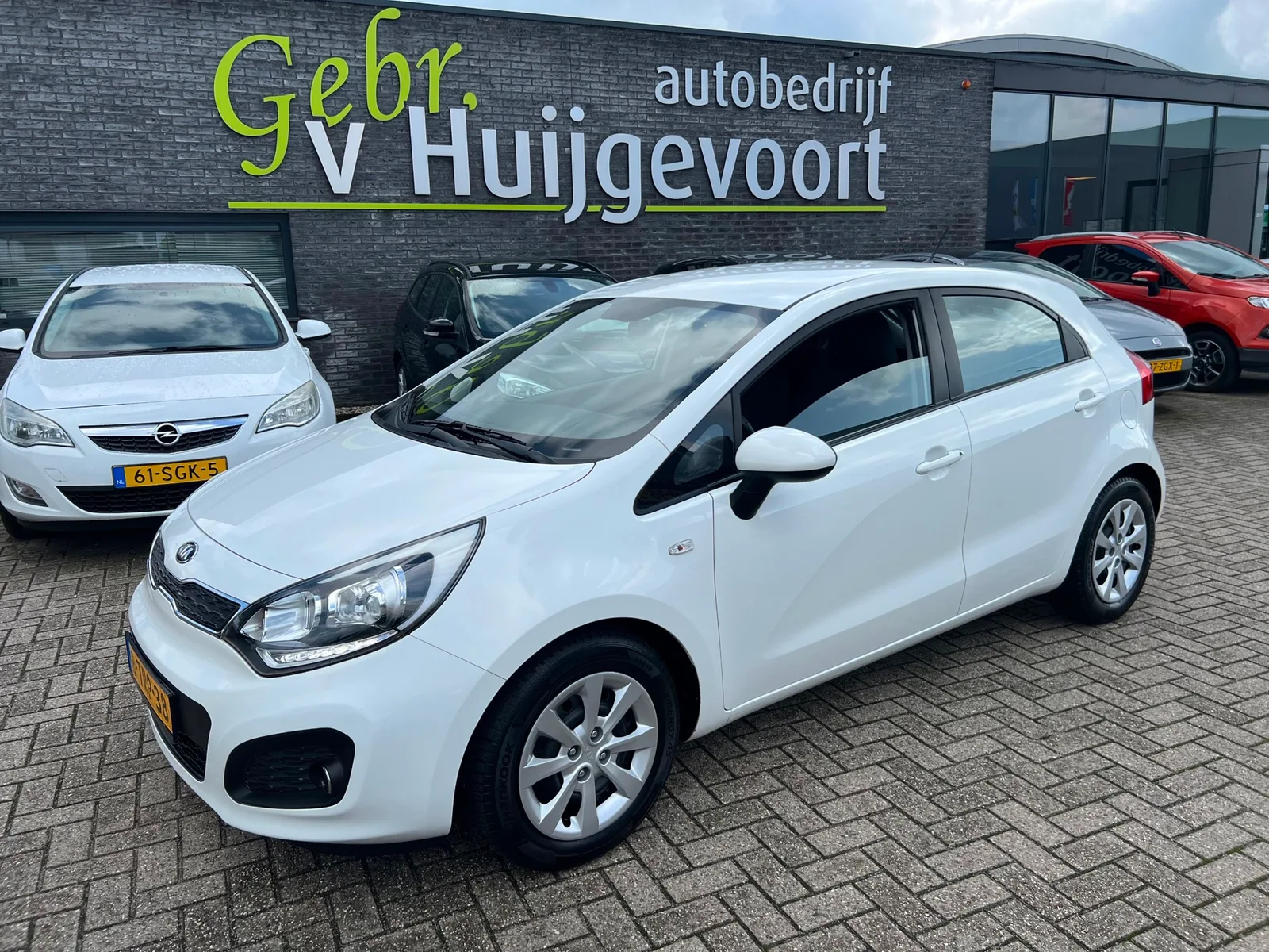 Kia Rio (2014) — foto 1