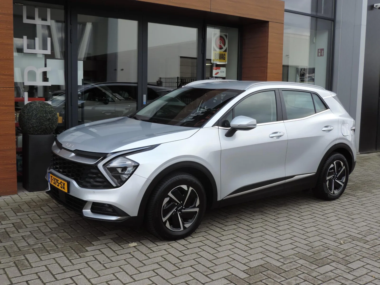 Kia Sportage (2023) — foto 1