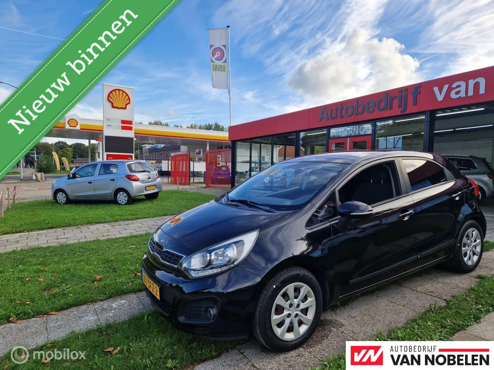 Kia Rio (2011) — foto 1