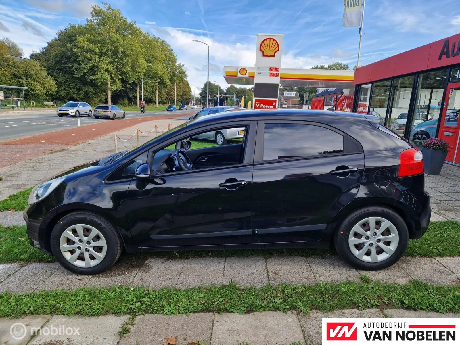 Kia Rio (2011) — foto 1