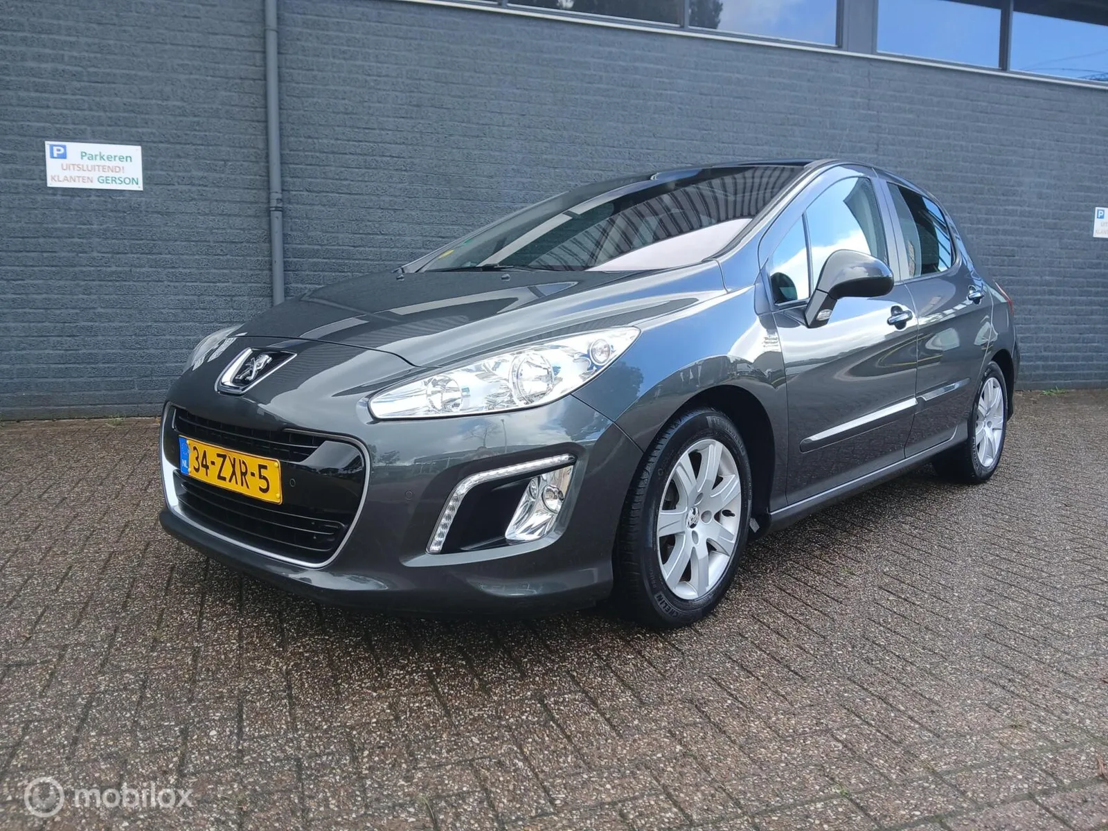 Peugeot 308 (2013) — foto 1