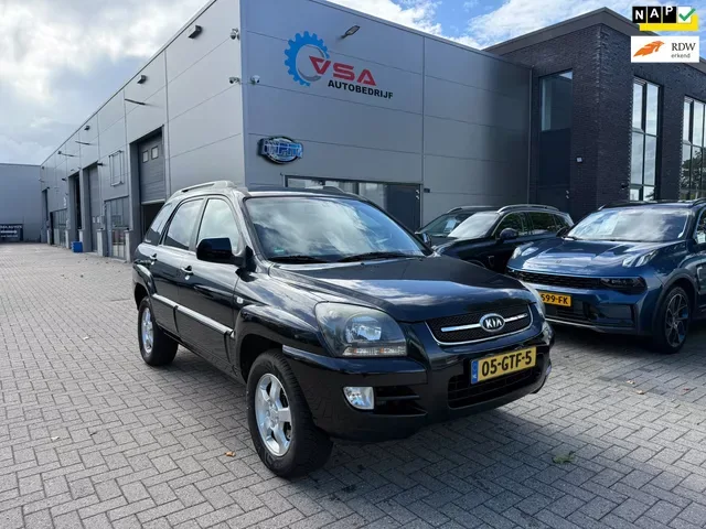 Kia Sportage (2009) — foto 1