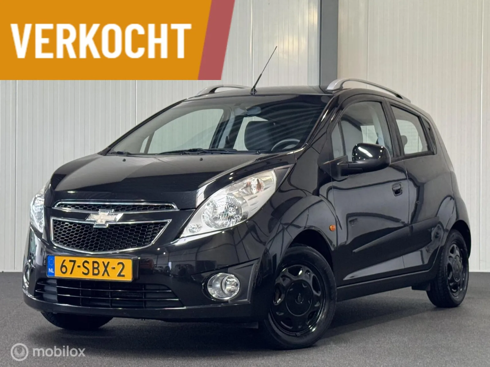 Chevrolet Spark (2011) — foto 1