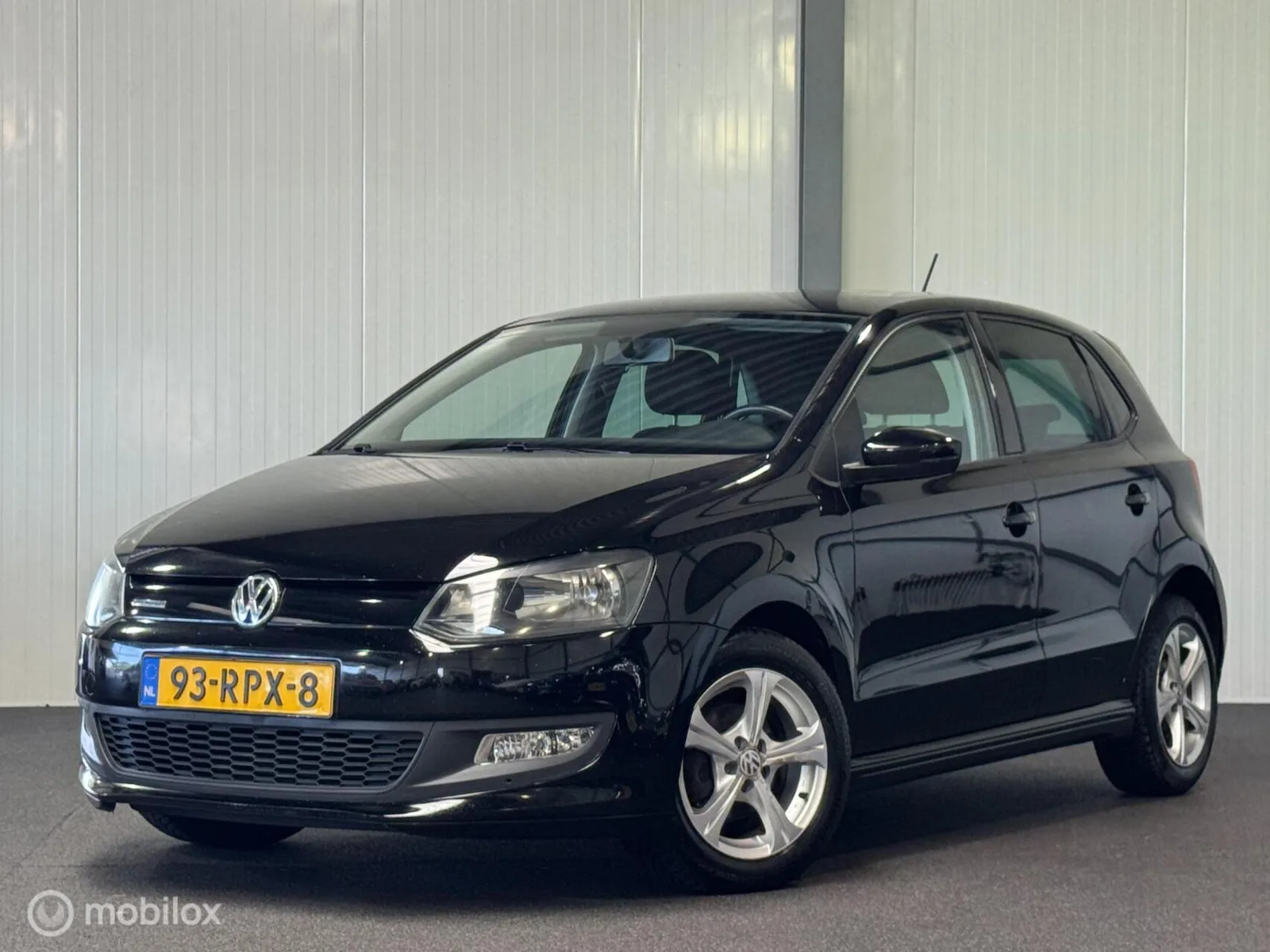 Volkswagen Polo (2011) — foto 1