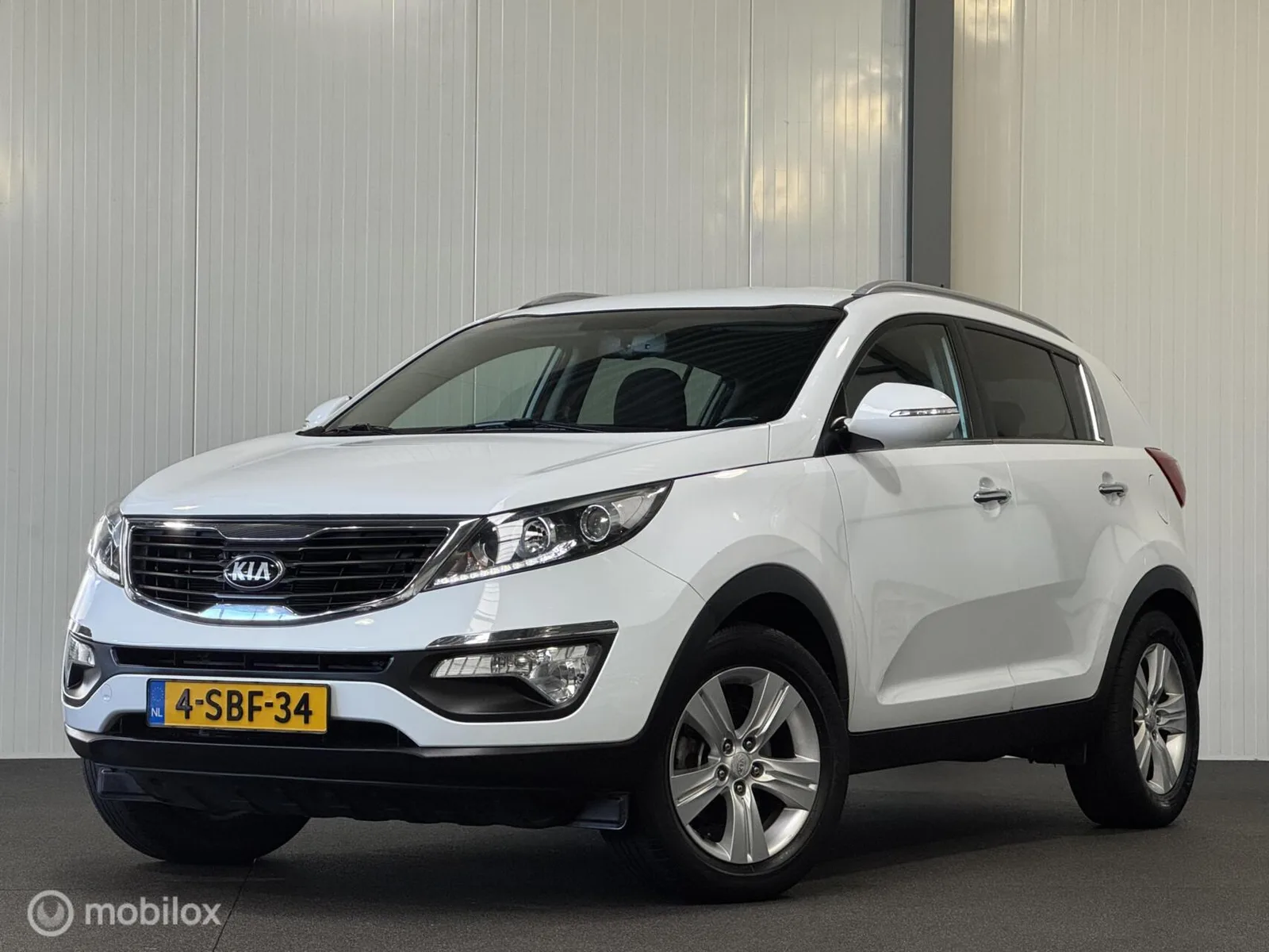 Kia Sportage (2013) — foto 1