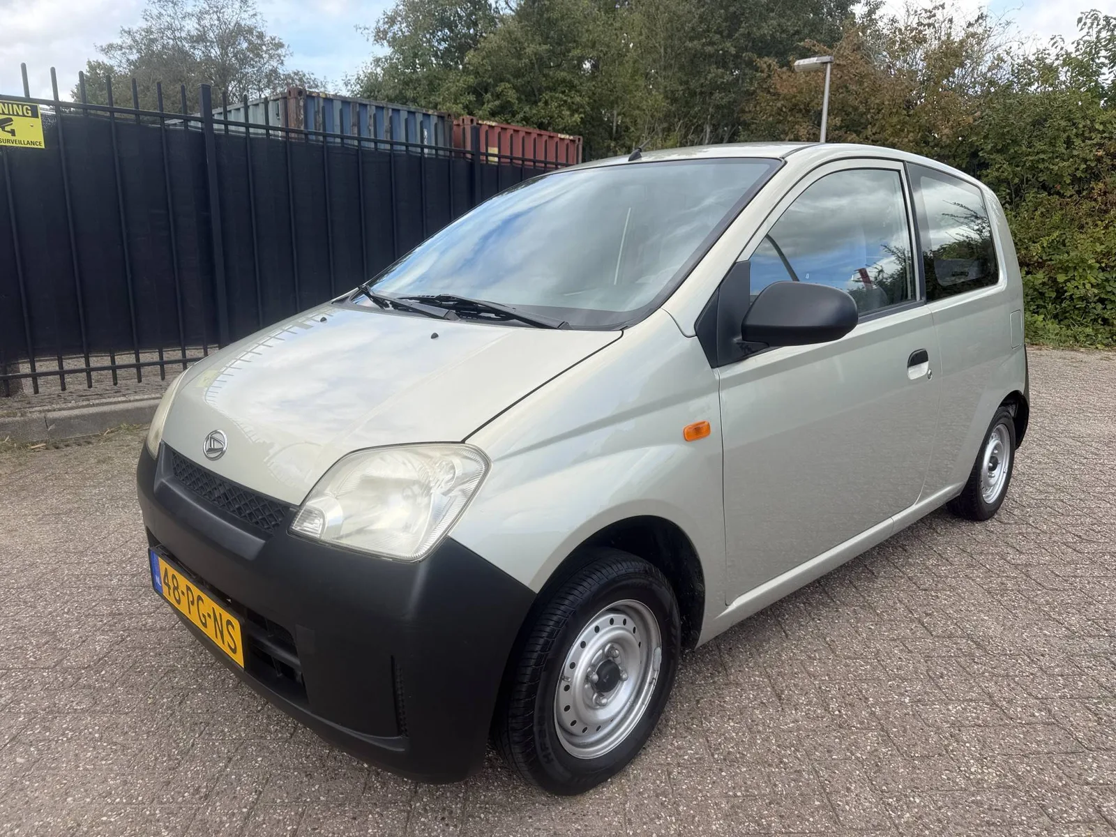 Daihatsu Cuore (2004) — foto 1