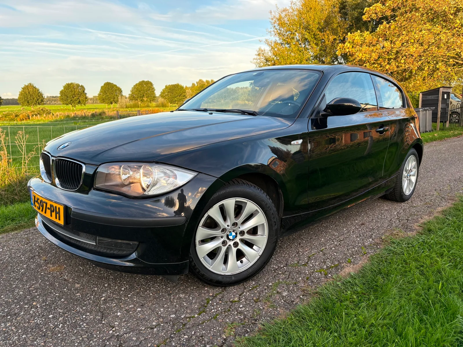 BMW 1-Serie (2009) — foto 1