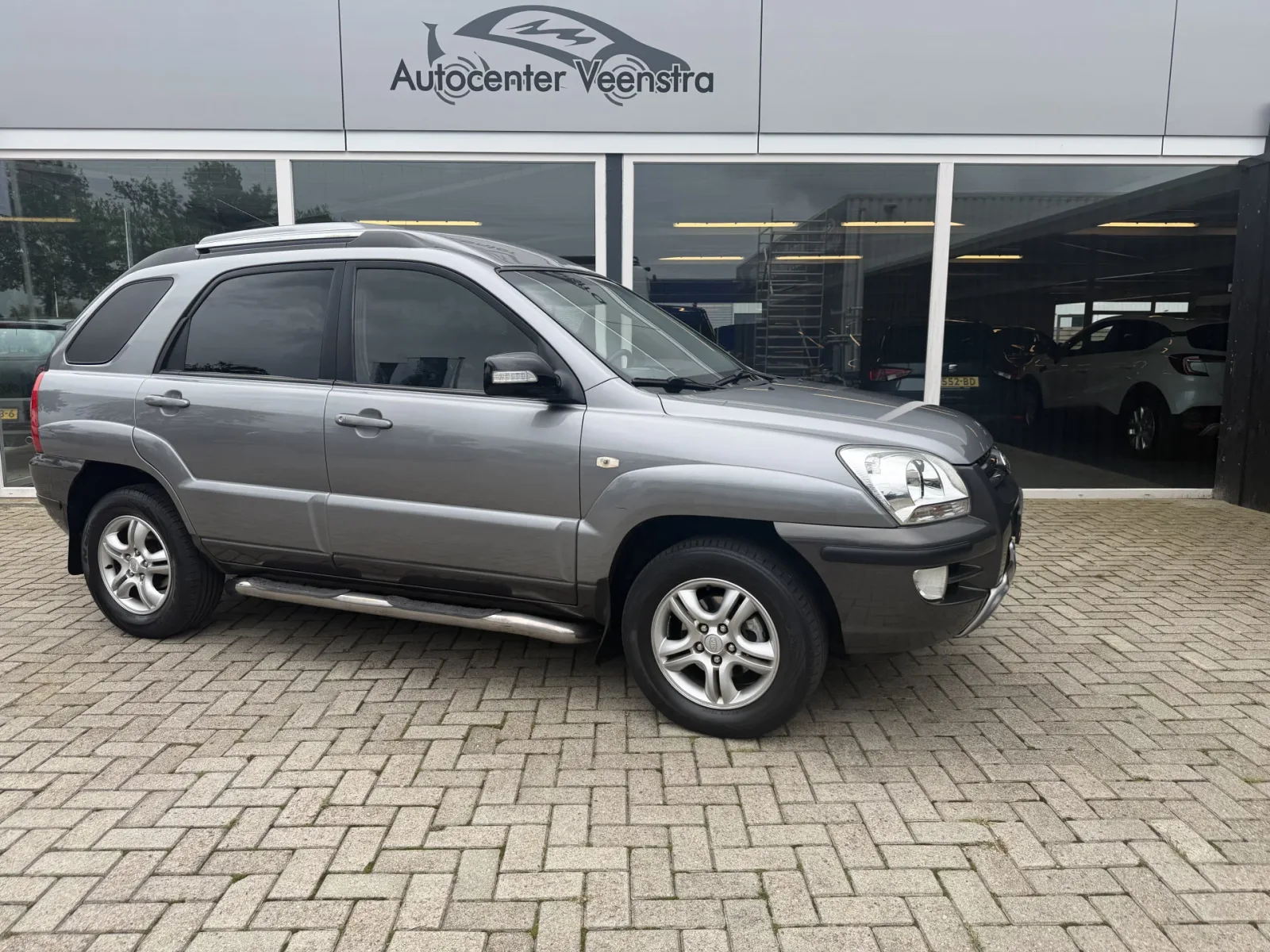 Kia Sportage (2006) — foto 1