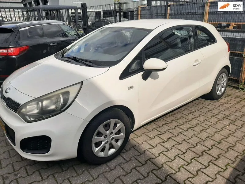 Kia Rio (2013) — foto 1