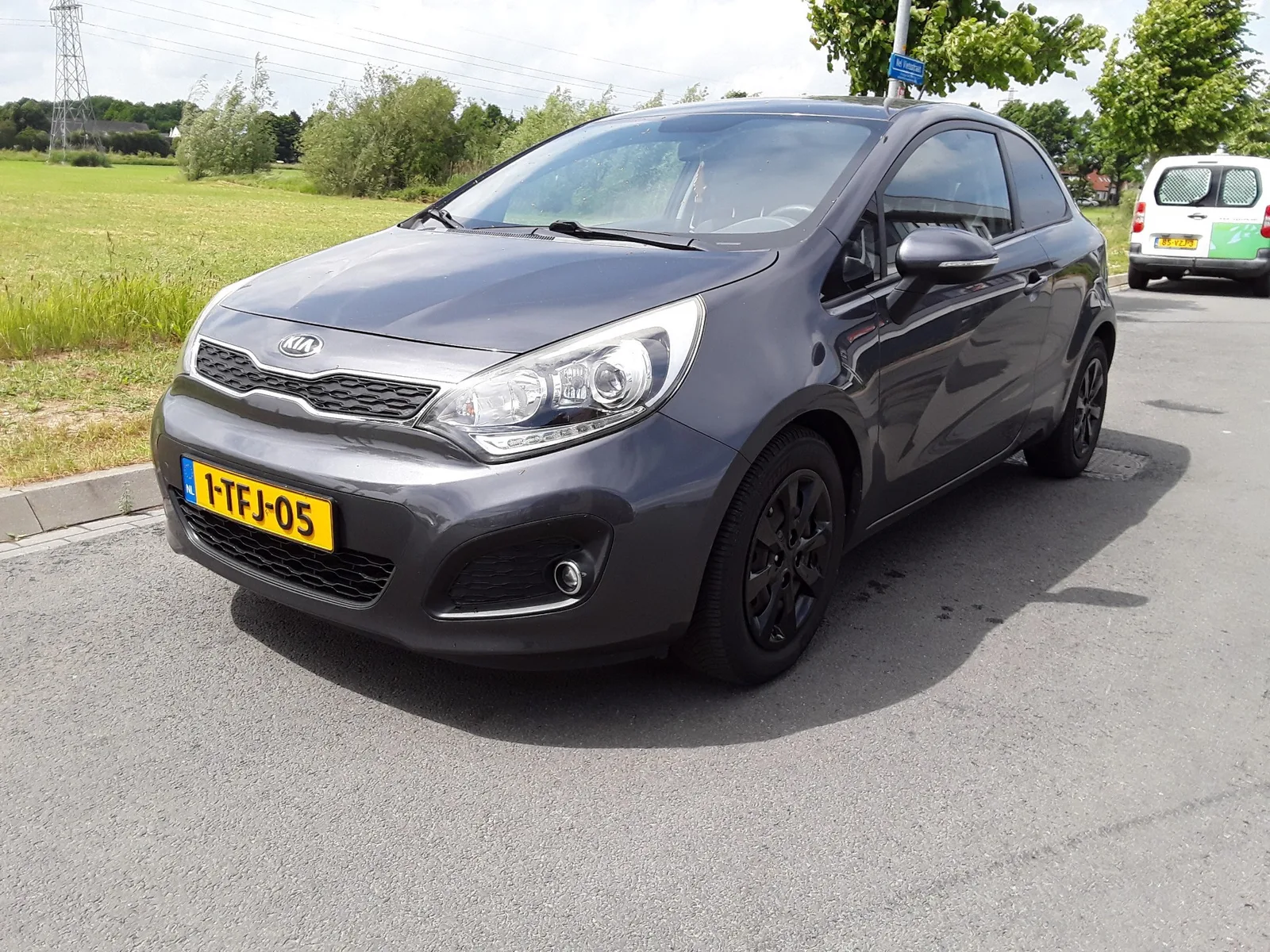 Kia Rio (2014) — foto 1