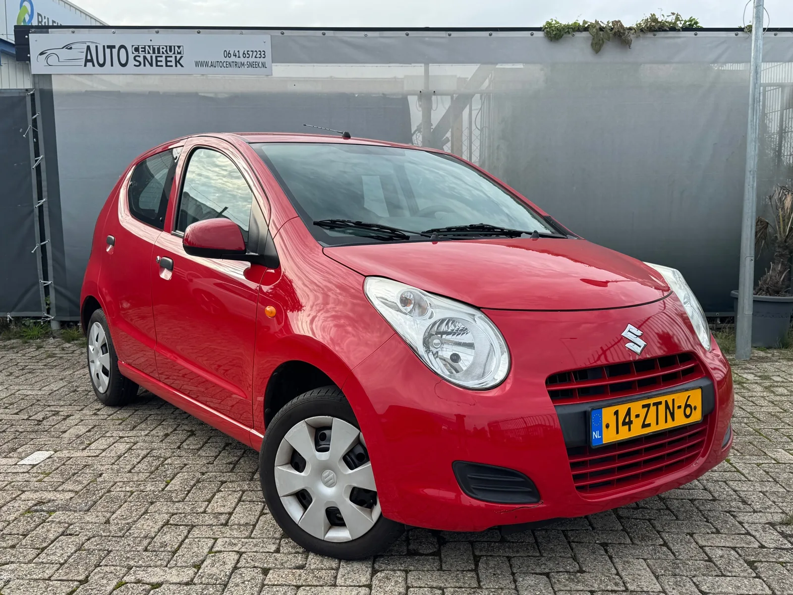 Suzuki Alto (2011) — foto 1