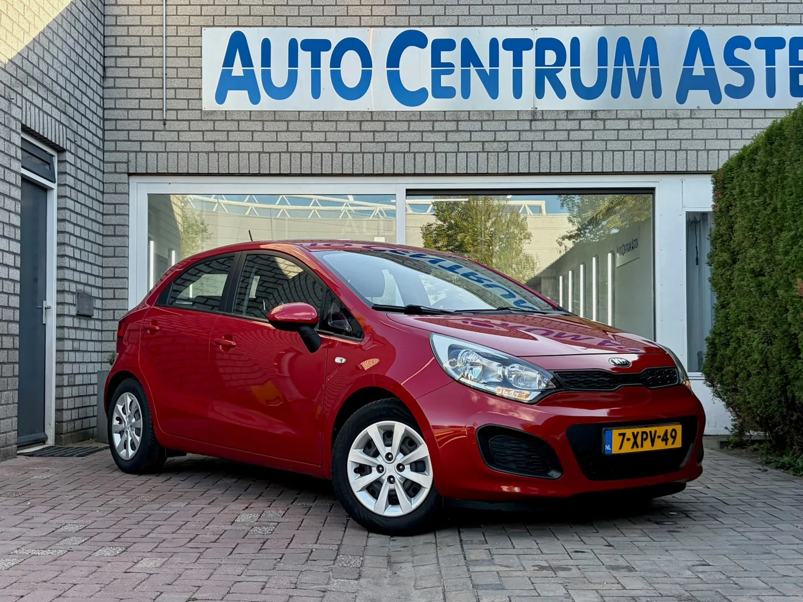 Kia Rio (2014) — foto 1