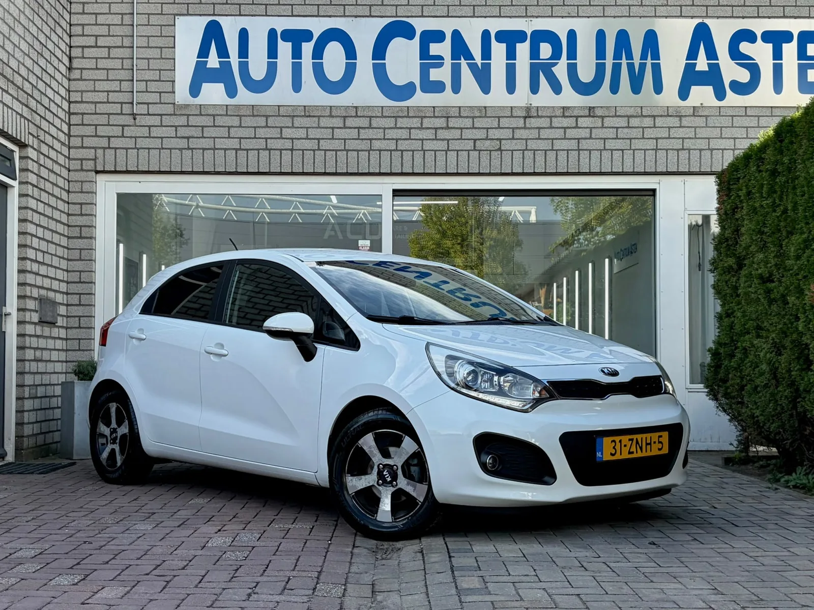 Kia Rio (2013) — foto 1