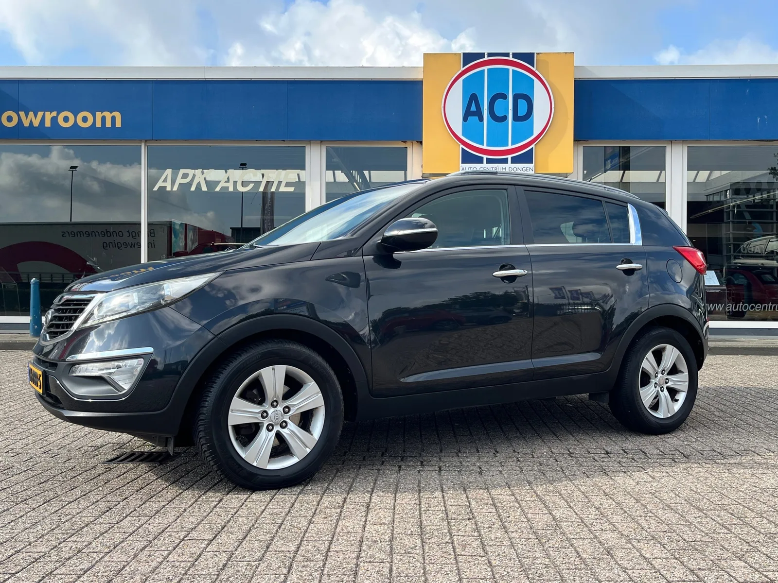 Kia Sportage (2011) — foto 1